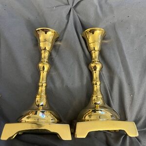 New brass candlesticks with candles
